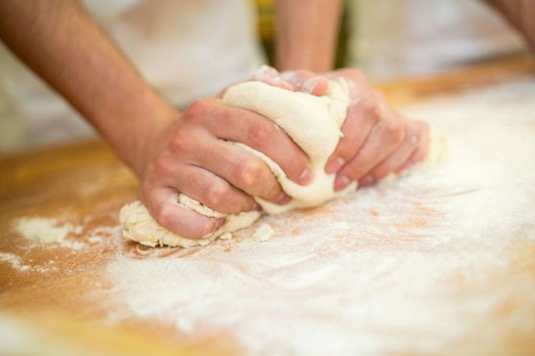 Helunap baker preparing fresh dough