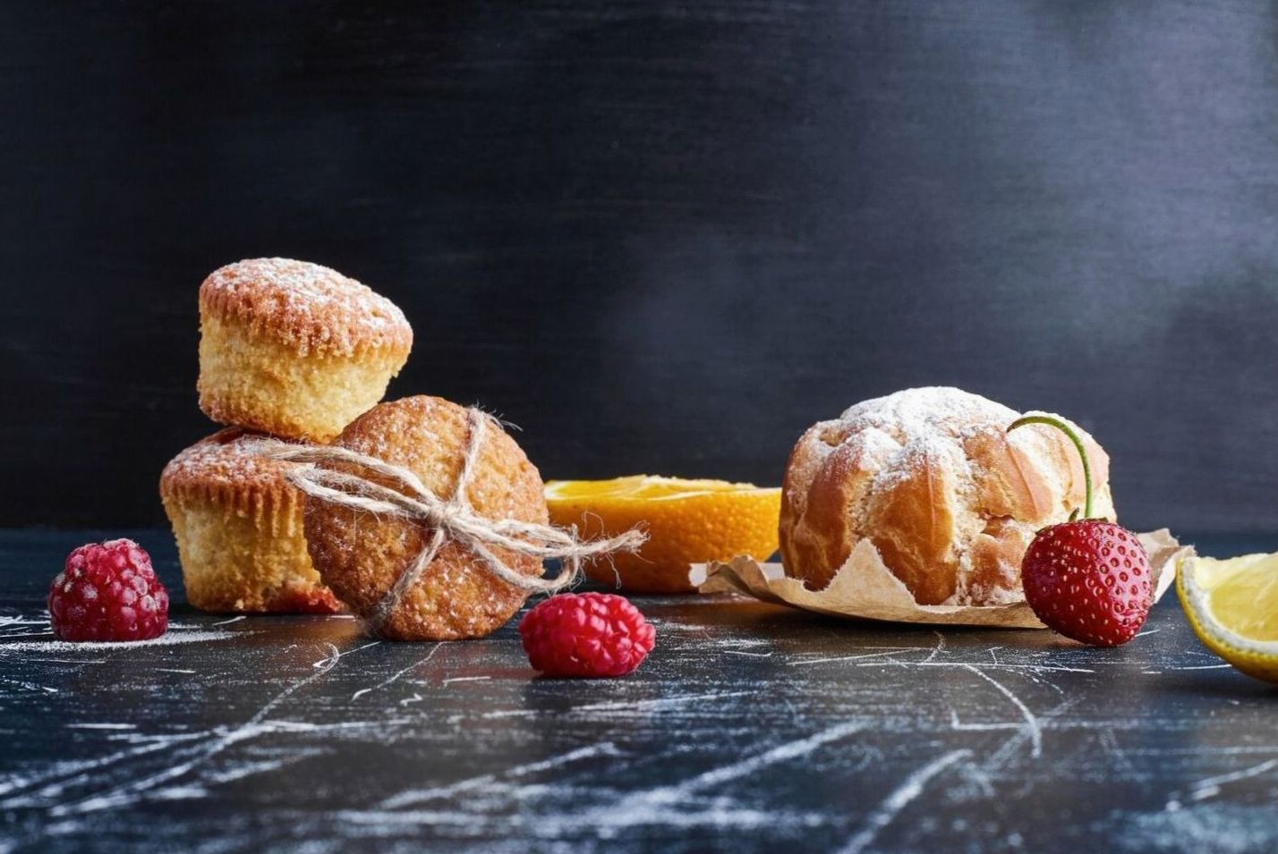 Fresh pastries arranged on a wooden counter